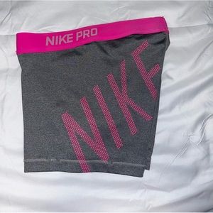 Gray and pink Nike pro spandex